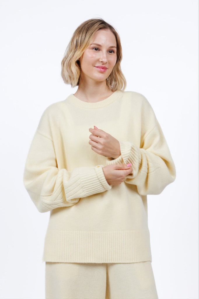 Cashmere Crewneck Sweater in Butter Yellow for women at shop AASHKA