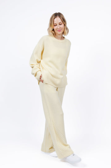Cashmere sweater lounge pants in butter yellow color for women at shop AASHKA