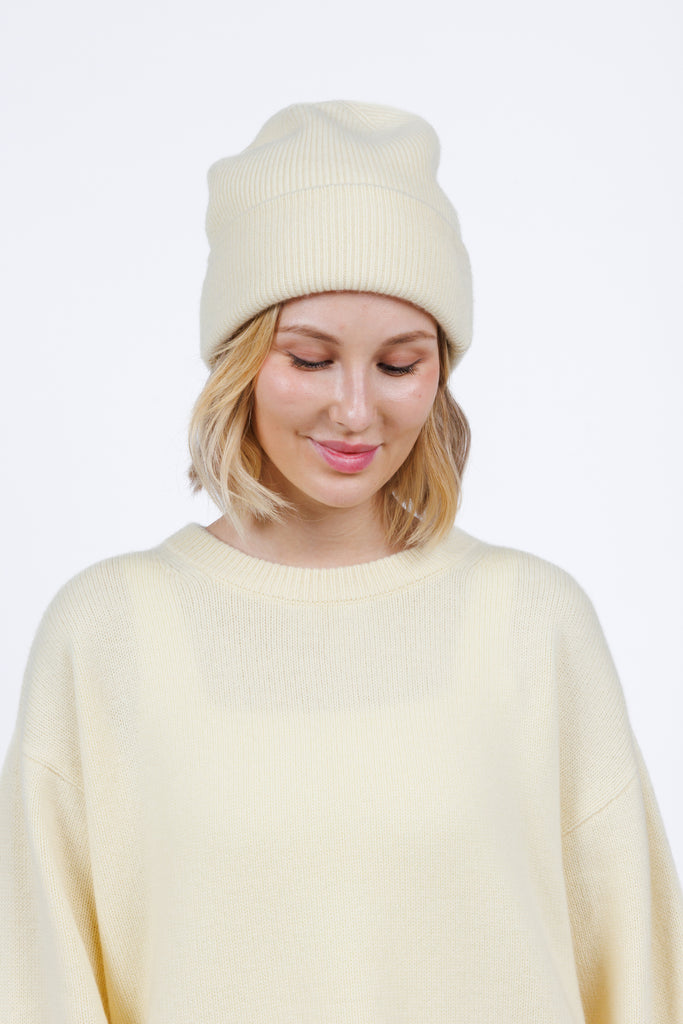 minimalist cashmere wool sweater beanie in Butter Yellow color for women at shop AASHKA